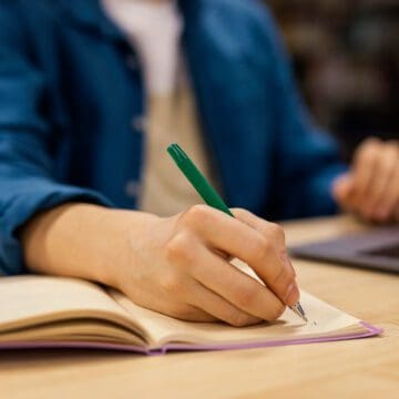 boy-studying-in-the-university-library