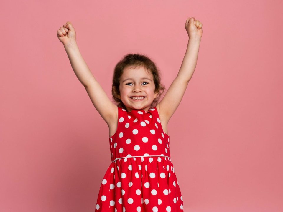 smiley-little-girl-in-red-dress